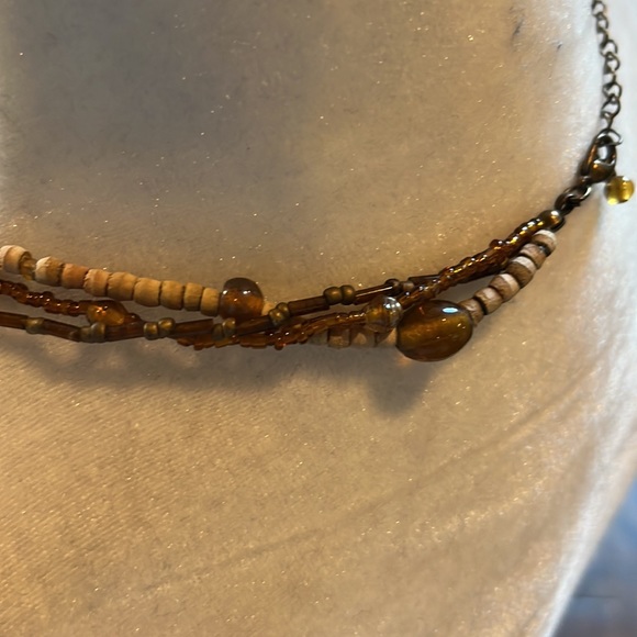 Brown beaded necklace. Worn several times. Listing #7022 - Picture 3 of 11